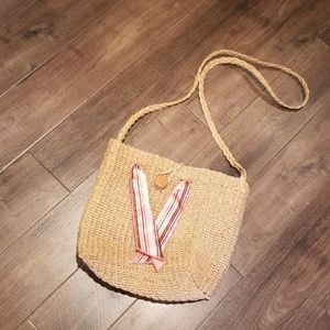 Straw purse with optional pink sash
